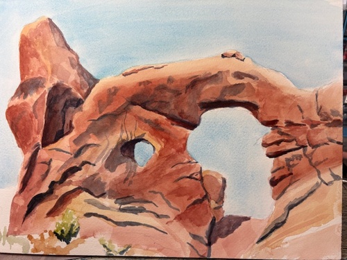 A watercolor painting of Turret Arch against a blue sky.