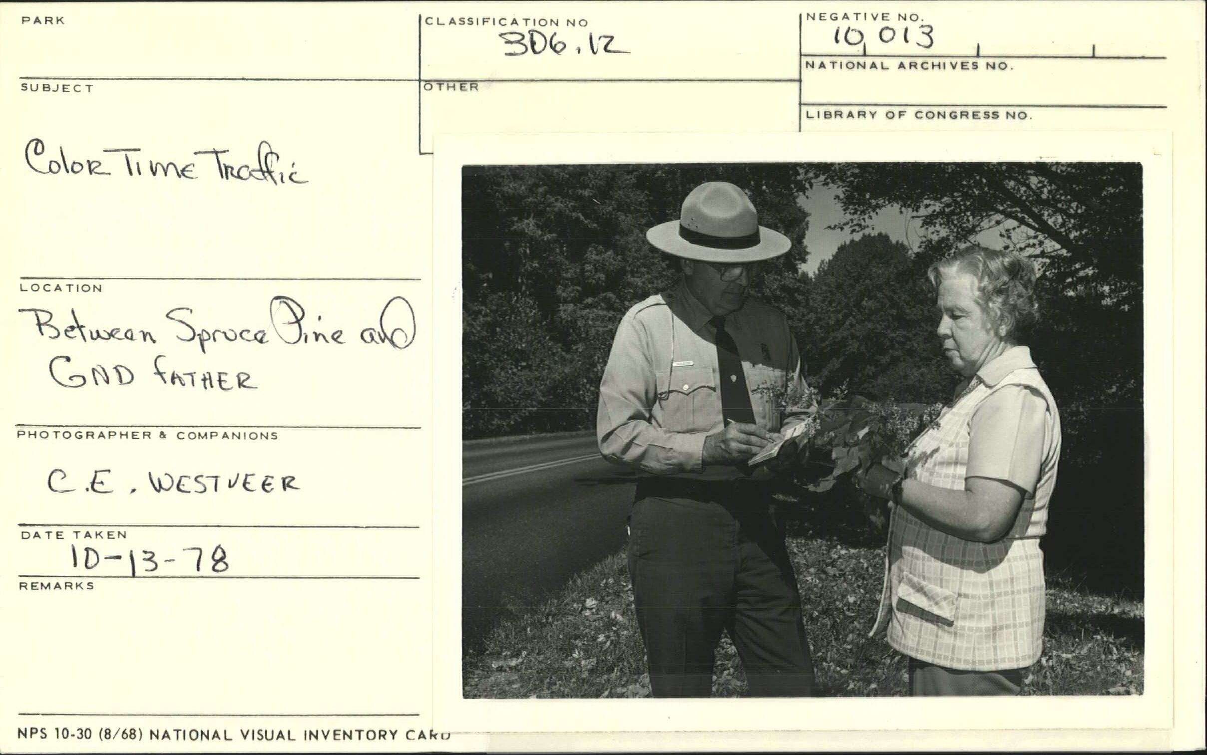 Ranger assisting visitor during peak foliage time