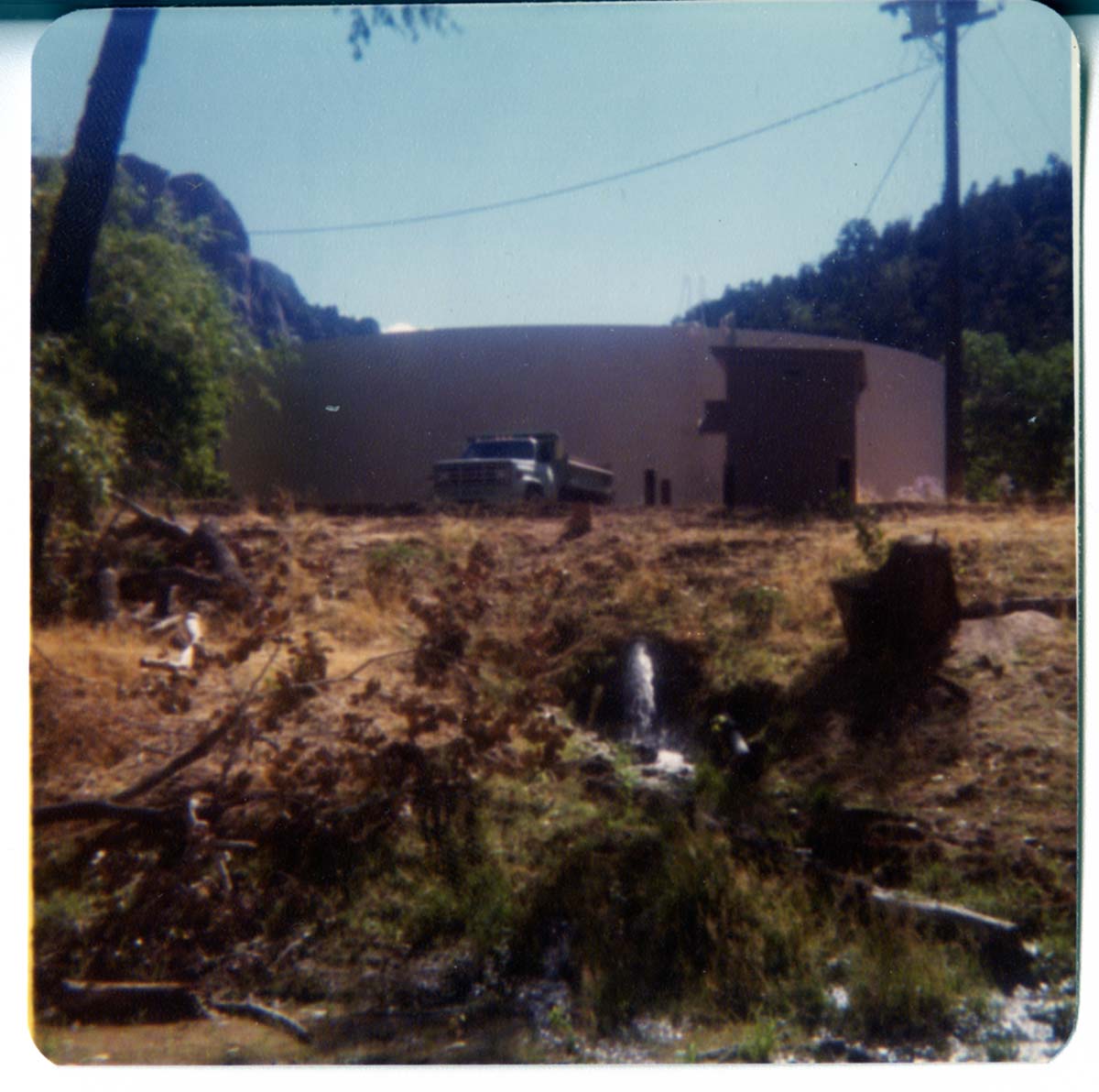 Repainting the exterior of the million gallon water tank at Birch Creek.