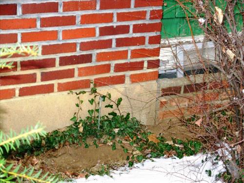 George Wallace House Foundation and Front Porch Cracks Harry S Truman NHS. These photos were taken to use as part of a PMIS request for funds to have the foundation and front porch replaced.