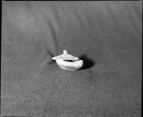 Marie Rozier Collection. Object: Philippine basket. Dimensions: 4 1/2". Materials: silk thread, probably a reed foundation. Photographed by Michael Dixon, December 1982. Catalogued by Craig Bates and Barbara Beroza. Yosemite Collections, National Park Service.