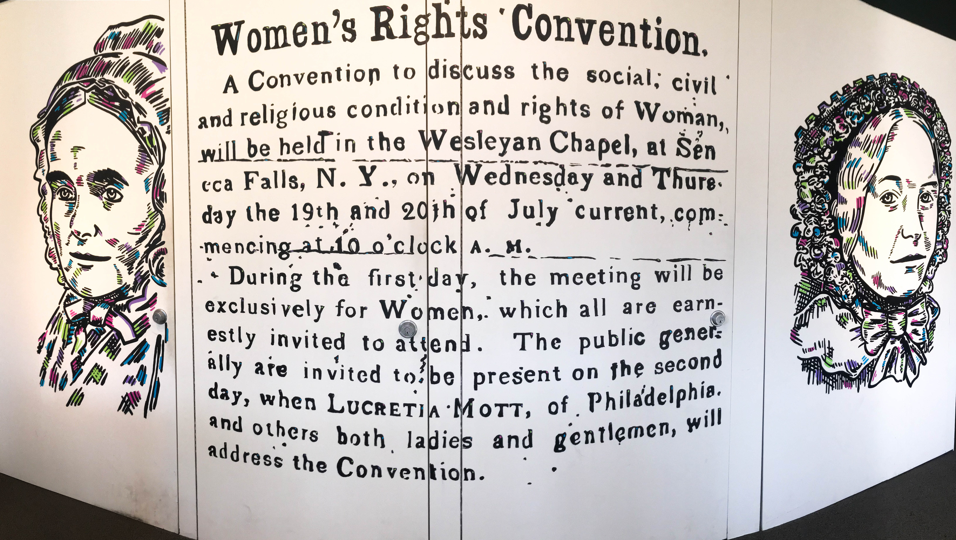 Mural on an interior wall including illustrations of two women and text about the Women's Rights Convention