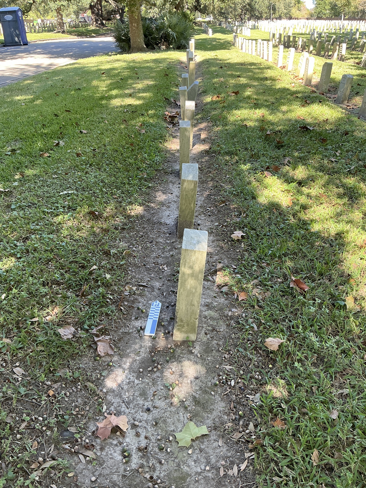 Extra image of historic upright marble headstone with recessed shield face.