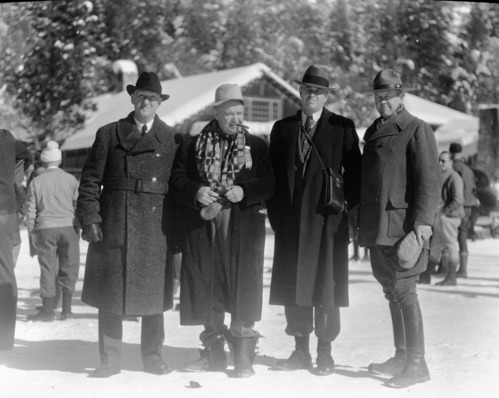 Gilmore Economy Run. L to R: Cannonball Baker, Motocyclist; Barney Oldfield, auto racer; Mr. Dodge, Indian showman; and Chief Ranger Townsley.