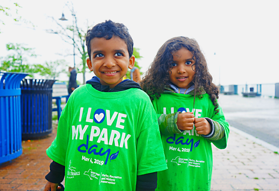 Children With Wide-Eyed Smiles Ready For A Day Of Adventure