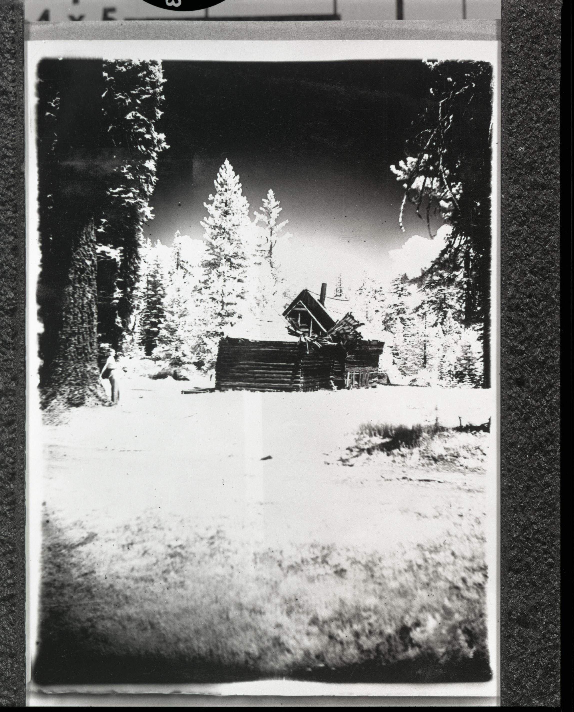 Infrared photo of cabin at Gin Flat. Copied from Art Holmes album (NPS employee) Copied September 1983 by Michael Dixon.