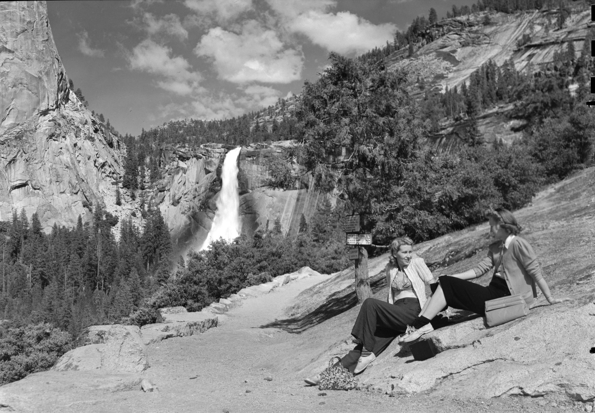 Nevada Fall with girls in foreground. Miss Anita Clark.