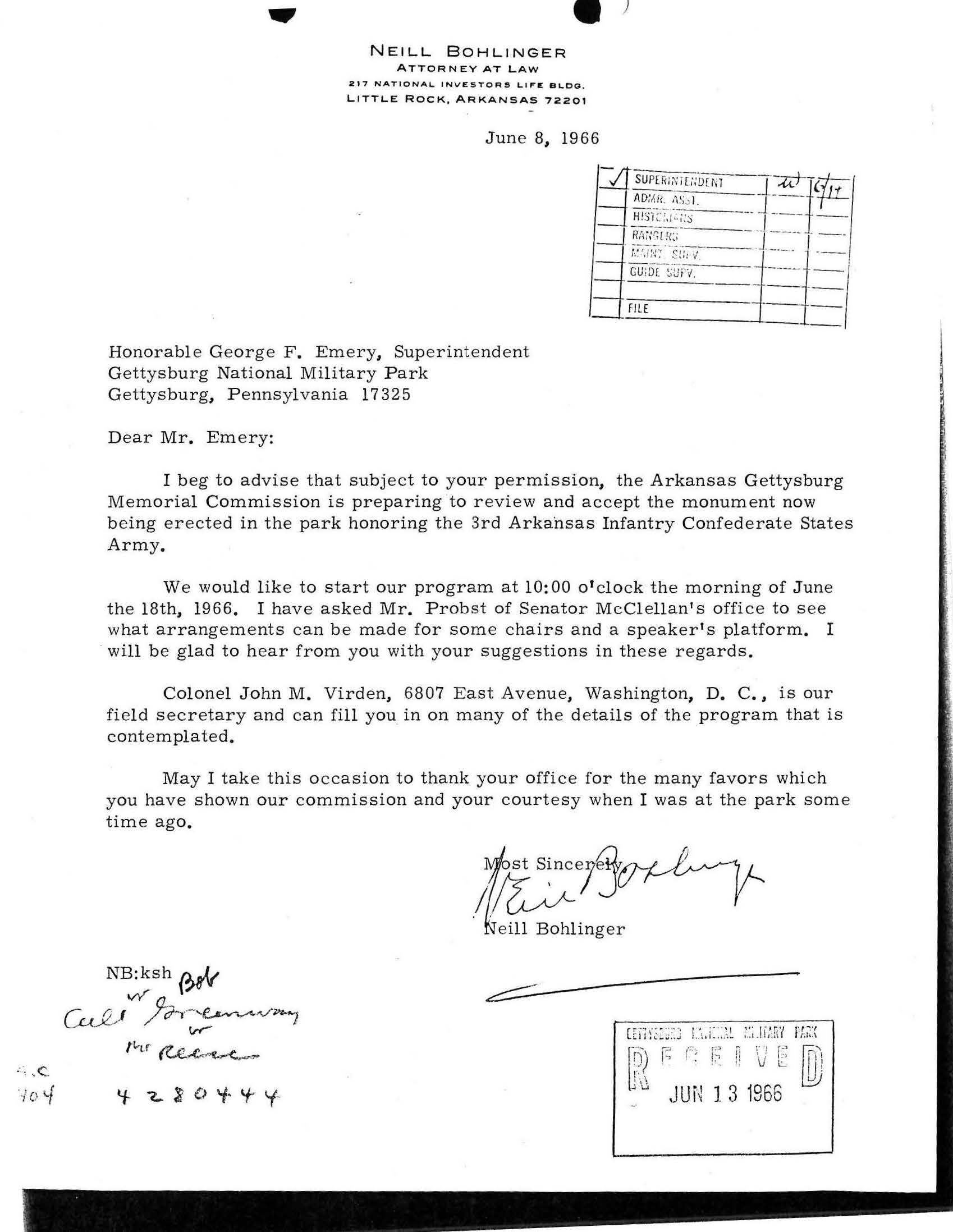 White paper with typed black text and a handwritten signature