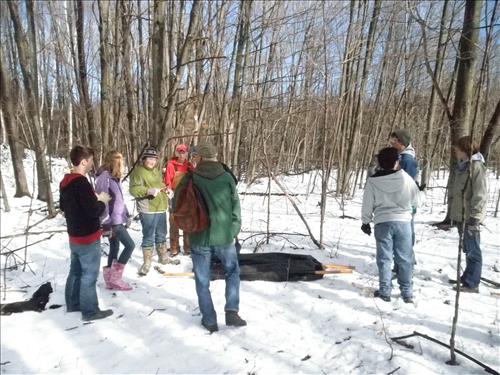 SLBE Benzie Central Earth Day 2011 Students Removing Fence from Woods