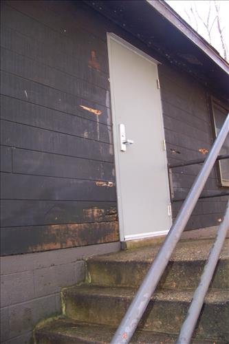 Paint and stain exterior of historic structures in camp 3 and camp 5 at Prince William Forest Park April 2012.