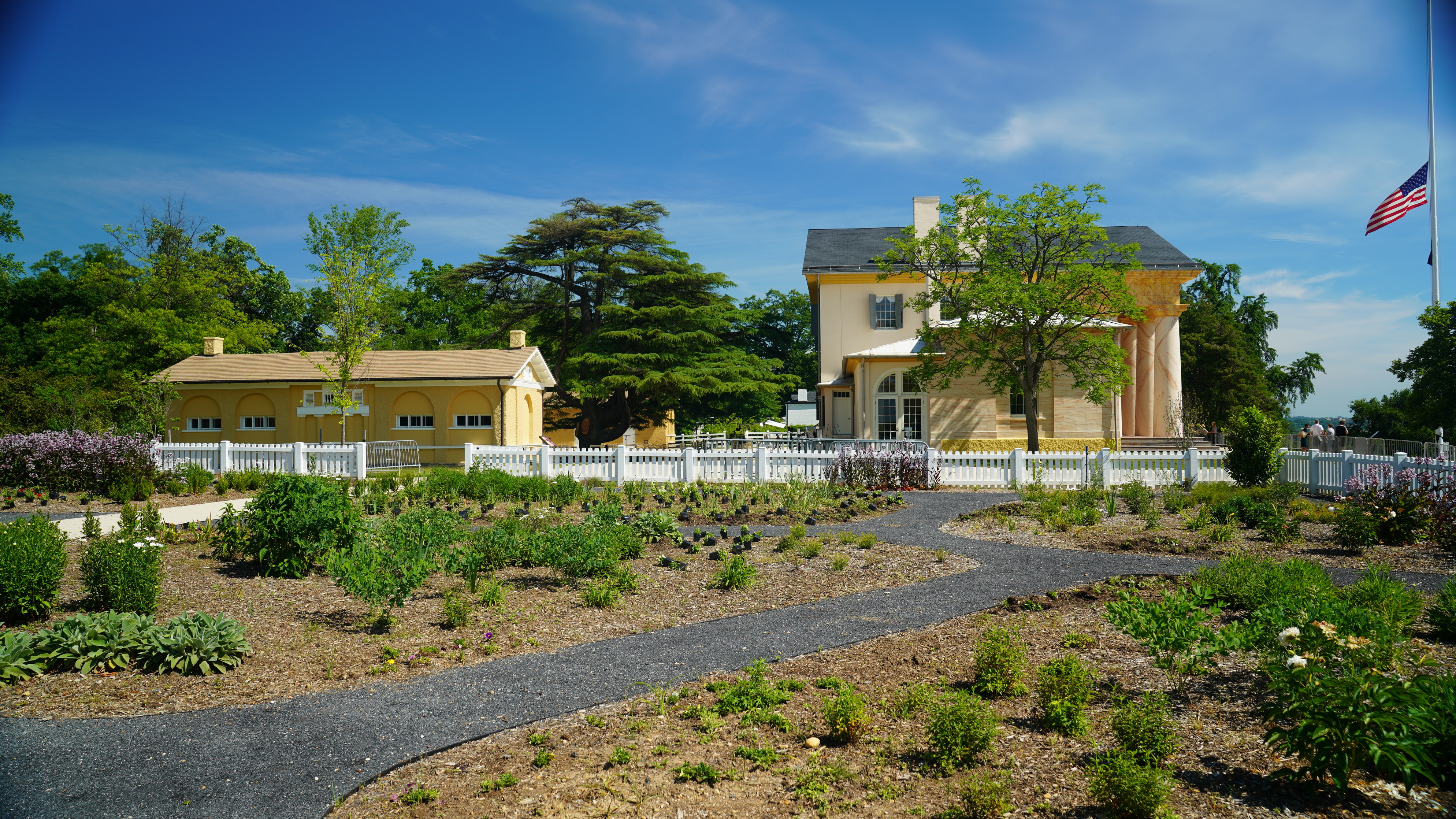 The exterior of the plantation house and slave quarters from the garden. 