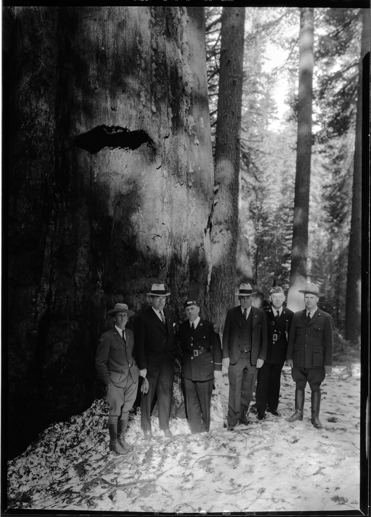 L-R: Supt. C. G. Thomson, Louis Johnson (Nat'l Commander of the American Legion), State Commander Atherton, Boyd Stratler, State Commander James K. Frishe (Friske), Assist. Supt. J. W. Emmert.