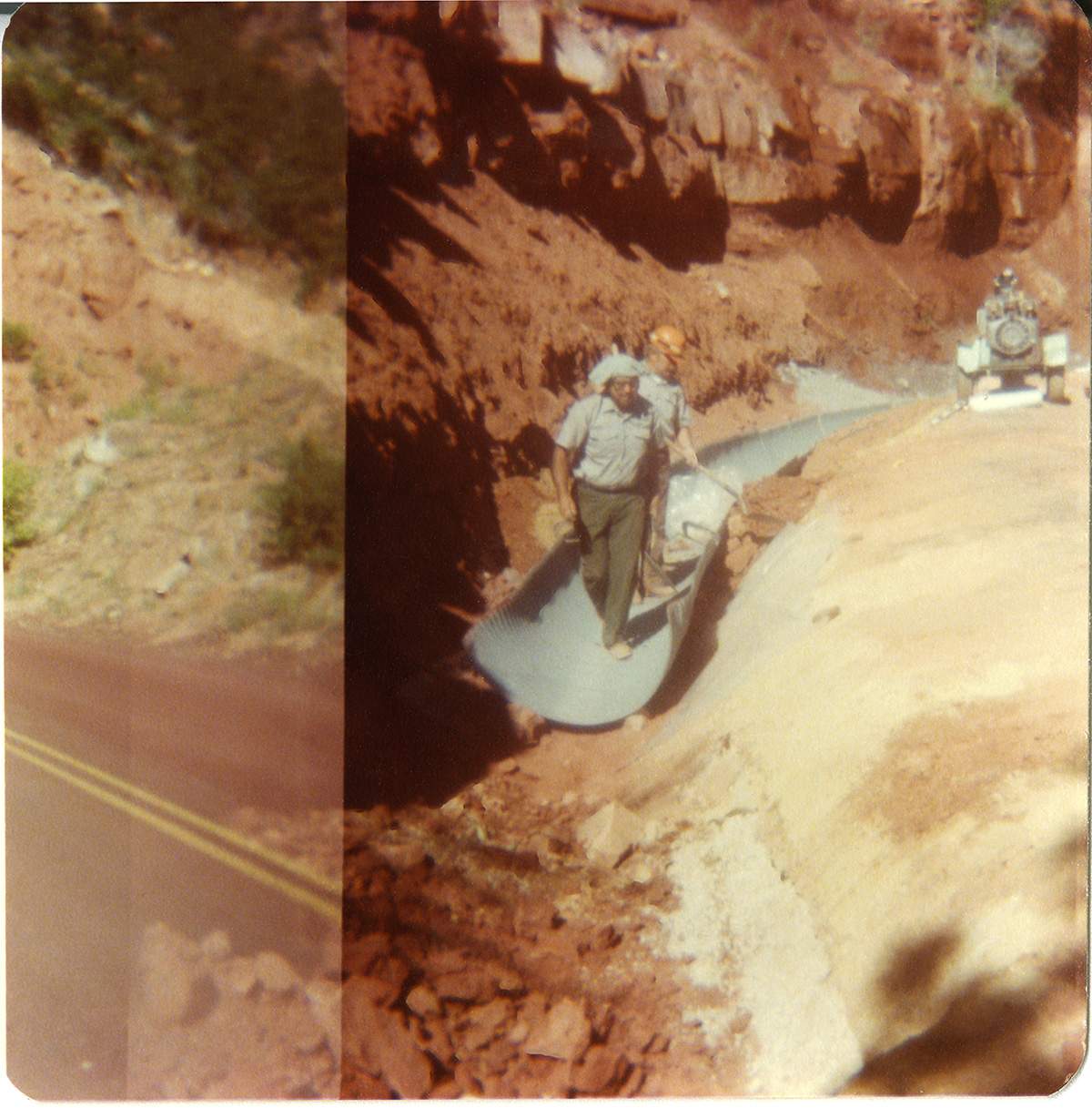 Men working on draining operations along the Zion-Mt. Carmel Highway switchbacks.