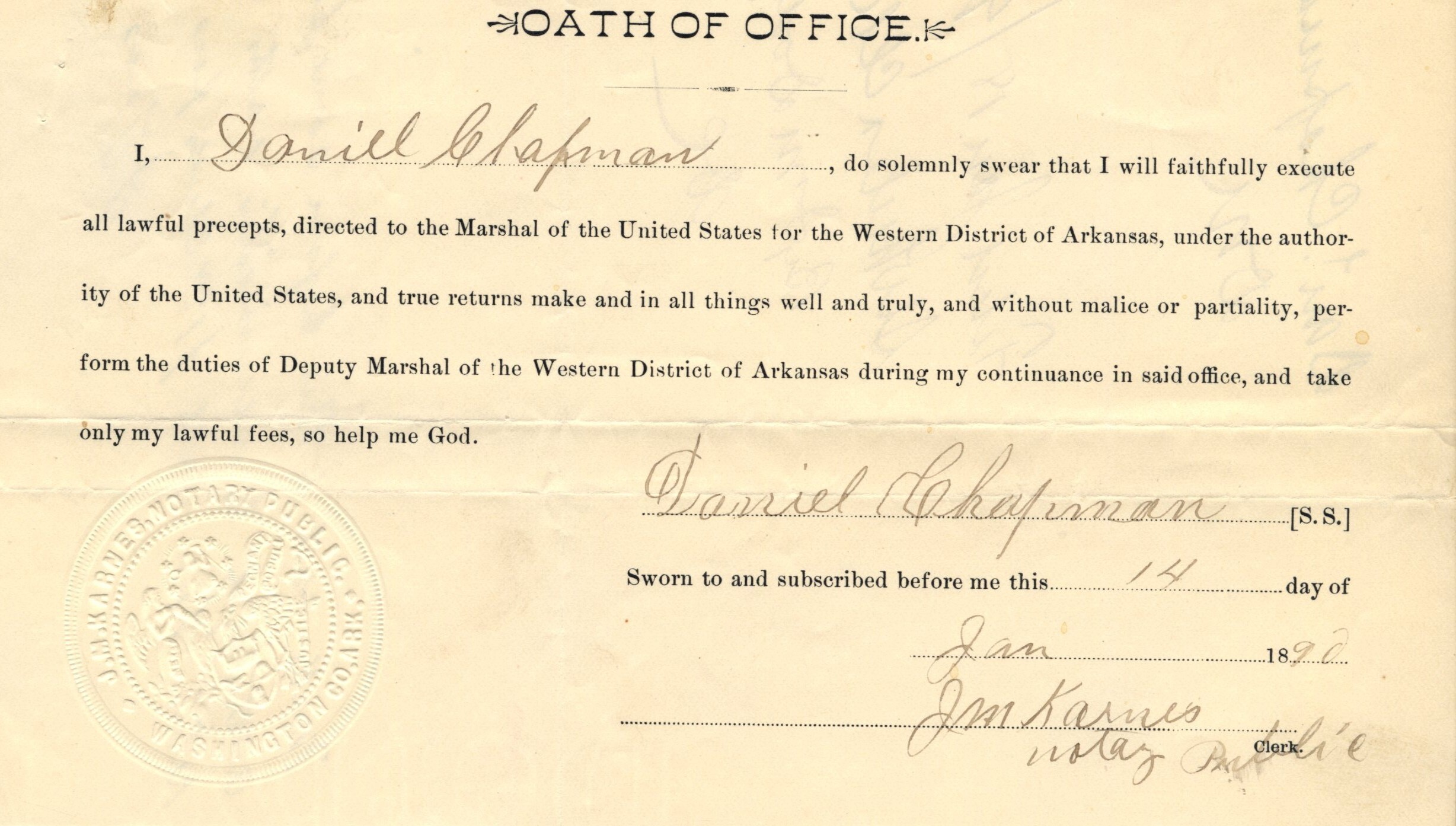 An aged slip of paper titled, "Oath of Office," with the signature of Daniel Chapman dated January 14, 1892. Text reads: “I do solemnly swear that I will faithfully execute all lawful precepts, directed to the Marshal of the United States for the Western District of Arkansas, under the authority of the United States, and true returns make and in all things well and truly, and without malice or partiality, perform the duties of Deputy Marshal of the Western District of Arkansas during my continuance in said office, and take only my lawful fees, so help me god.”
