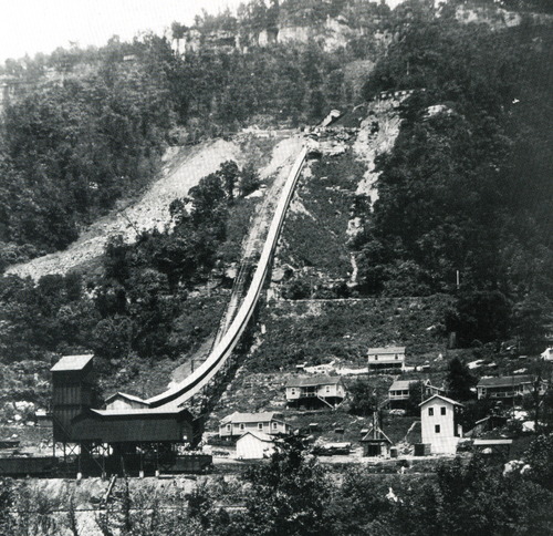 historic photo of a coal camp with houses, tipple, and coal conveyor