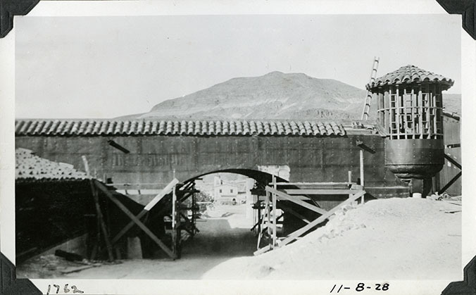 This is an historic black and white photograph from the Scotty's Castle Historic Photograph Collection, Death Valley National Park of Scotty's Castle Stables detail of east connecting wall construction. October 8, 1928. Photographed by Mat Roy Thompson.