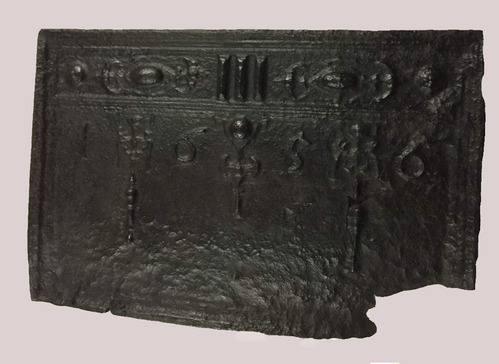 Fireback made at Hammersmith (Saugus Iron Works), 1656. Cast Iron, 54 cm x 85 cm x 3.6 cm. National Park Service Collections, SAIR 12322. Firebacks were mounted on the back wall of the fireplace to protect the bricks from heat. They were often highly decorative and could include the initials of the owners as well as the date. This fireback has raised decorations of columns and circles, the same type of decoration that would be seen on the carved furniture of the period.