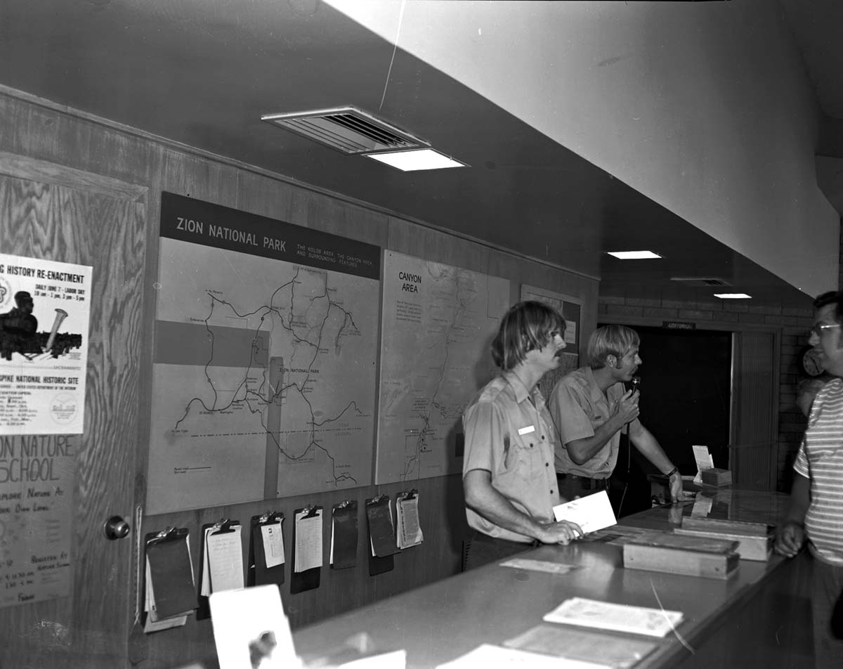 Student Conservation Association (SCA) volunteers Eric Thum and Ken Kertell (NPS) at Visitor Center.