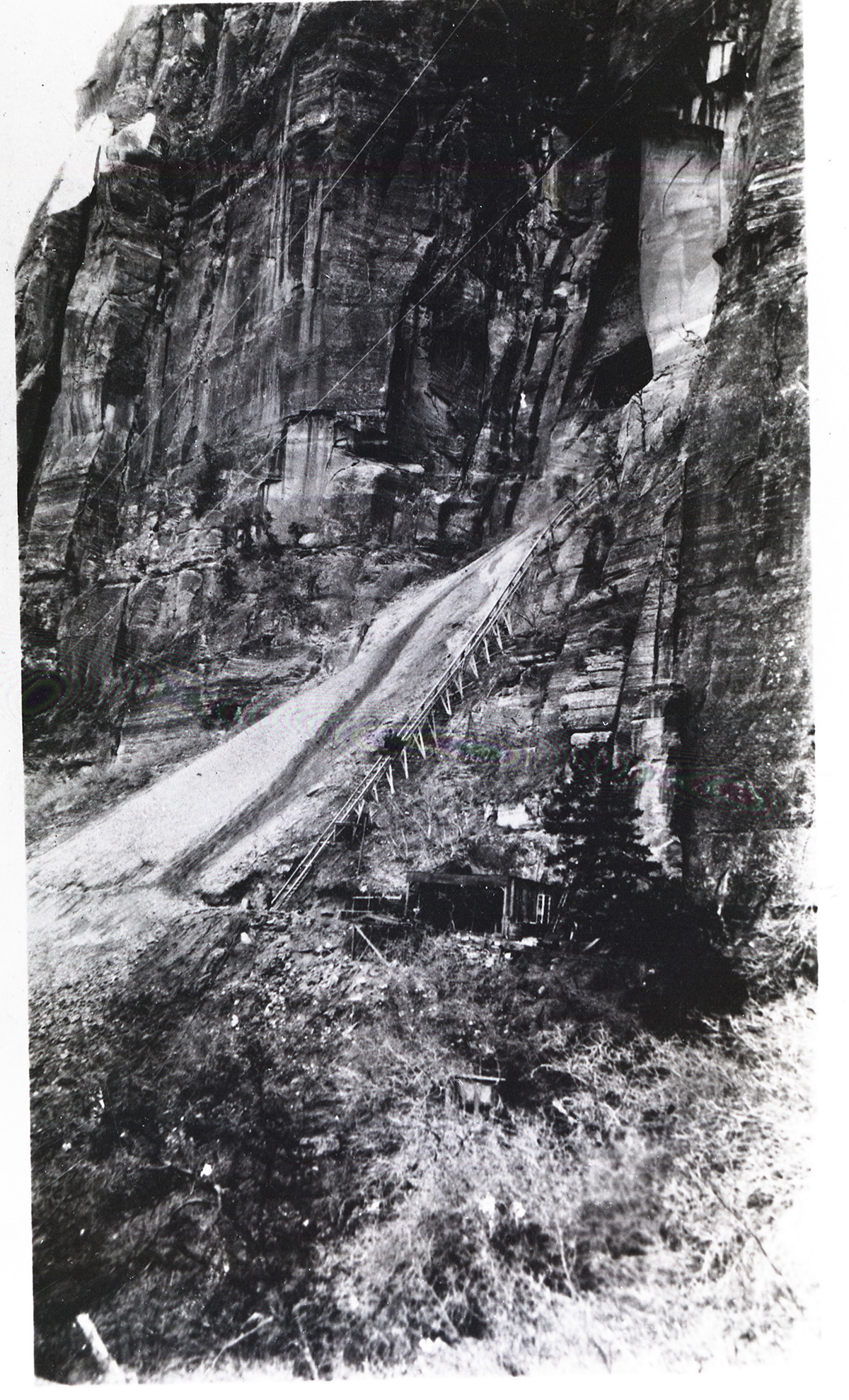 Tram and debris from construction of long tunnel, Zion Mt Carmel Hwy.