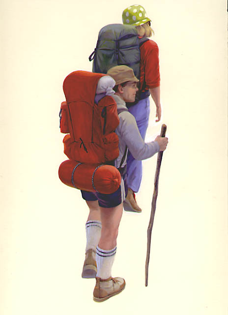 Male and female backcountry hikers carrying backpacks and using walking sticks.