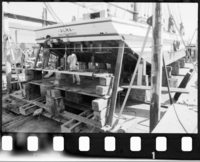Various views of Alma (built 1891; scow schooner) in drydock, 1987. Various views of Alma (built 1891; scow schooner) in drydock, undergoing repairs and  during the spring of 1987.
