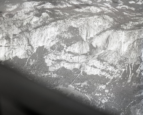 Yosemite Falls. Aerial photographs of flight over park. For use in publications being prepared by Menning and for other purposes.