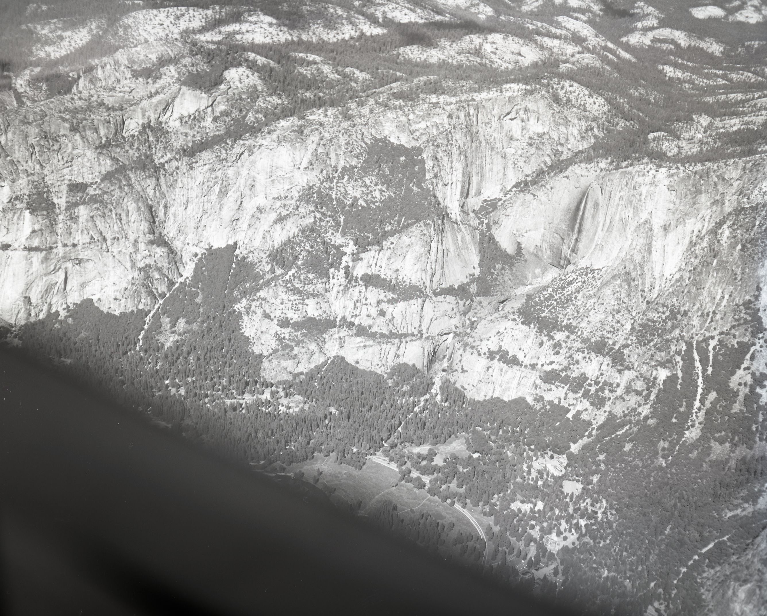 Yosemite Falls. Aerial photographs of flight over park. For use in publications being prepared by Menning and for other purposes.
