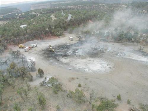 Aerial views of Chapin Mesa area in and around buildings depicting burn areas in the aftermath of the Long Mesa Fire at Mesa Verde National Park, August 2002