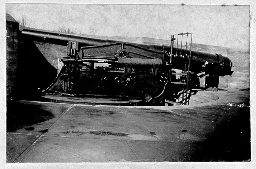Steel carriage with large cannon.  The carriage is in a lowered position.  Part of the Endicotte Battery System.