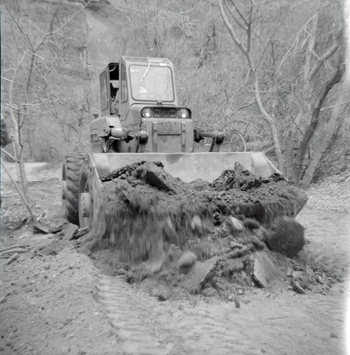 Excavator clearing the road for construction activities near the Temple of Sinawava.