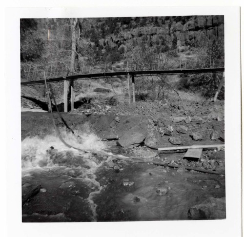 Protection/stabilization of the footings for the old Birch Creek suspension footbridge.