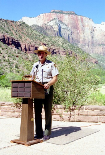 Color Photos of the parks 72nd anniversary celebrations- cake cutting, barbecue, speakers.