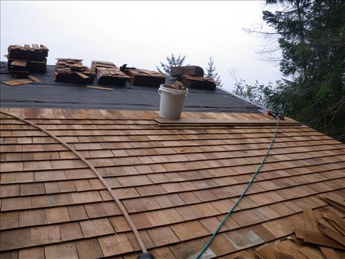 Reroofing of Glacier Bay National Park canoe shelter in September 2011