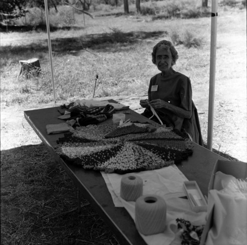 Woman demonstrating making knitted rugs at the second annual Folklife Festival, Zion National Park Nature Center, September 7-8, 1978.