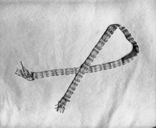 Mrs. Donald Segerstrom Collection. Object: Paiute (?) beaded section. Dimensions: 26 1/4". Materials: Transparent clear and blue beads, white thread. Technology: Single thread loomwork. Photographed by Michael Dixon. Catalogued by Craig Bates and Barbara Beroza. Yosemite Collections, National Park Service. 1/83.