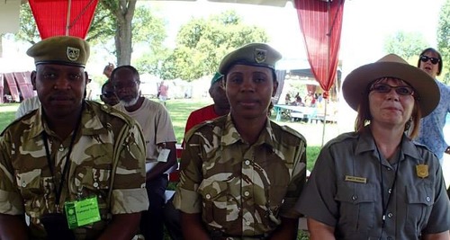 Kenyan Wildlife Rangers and US National Park Ranger in full uniform