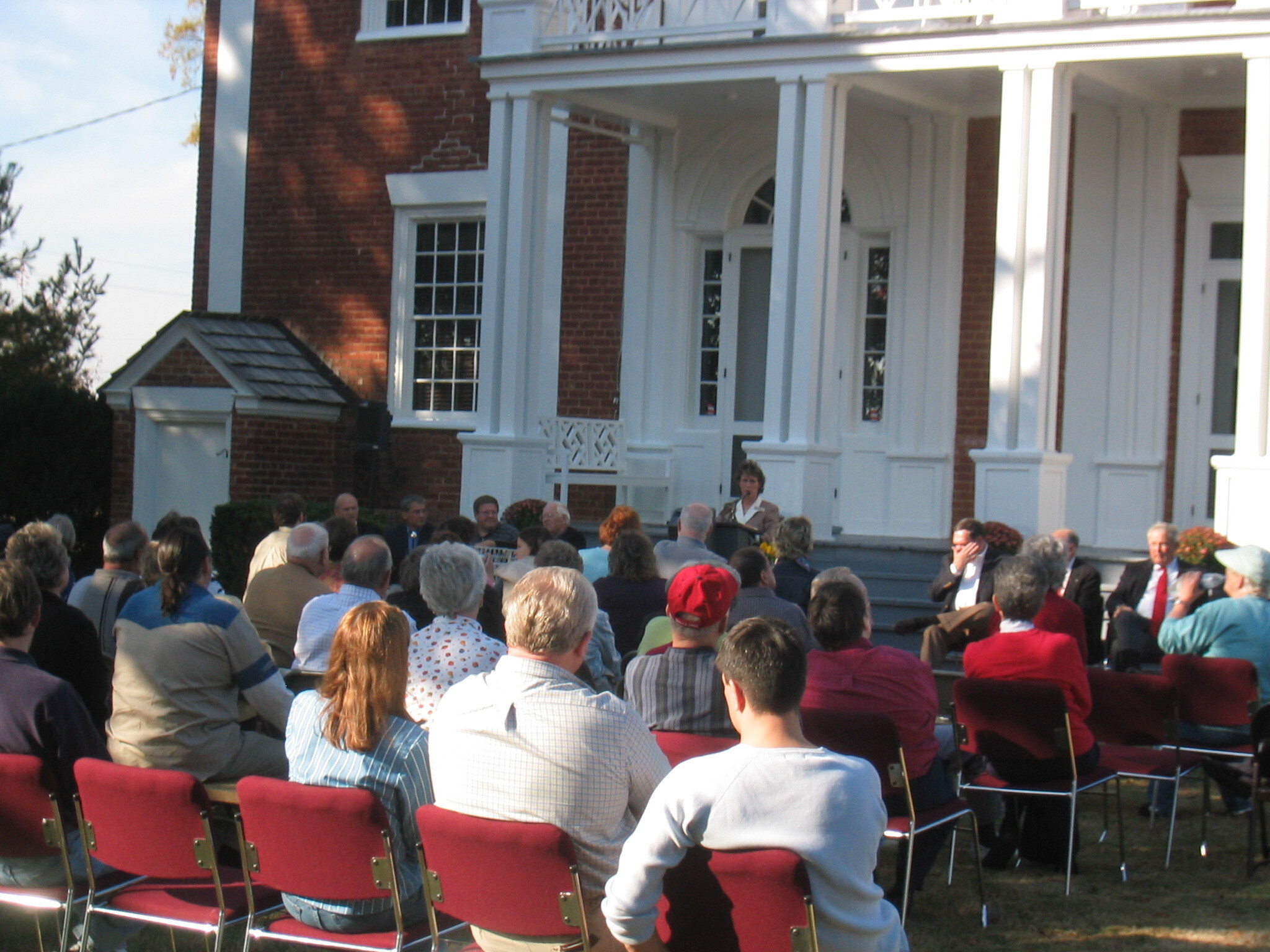 A speaker gives an address at the Trust for Public Land, land acquisition dedication at the Chief Vann House Historic Site near Chatsworth, Georgia