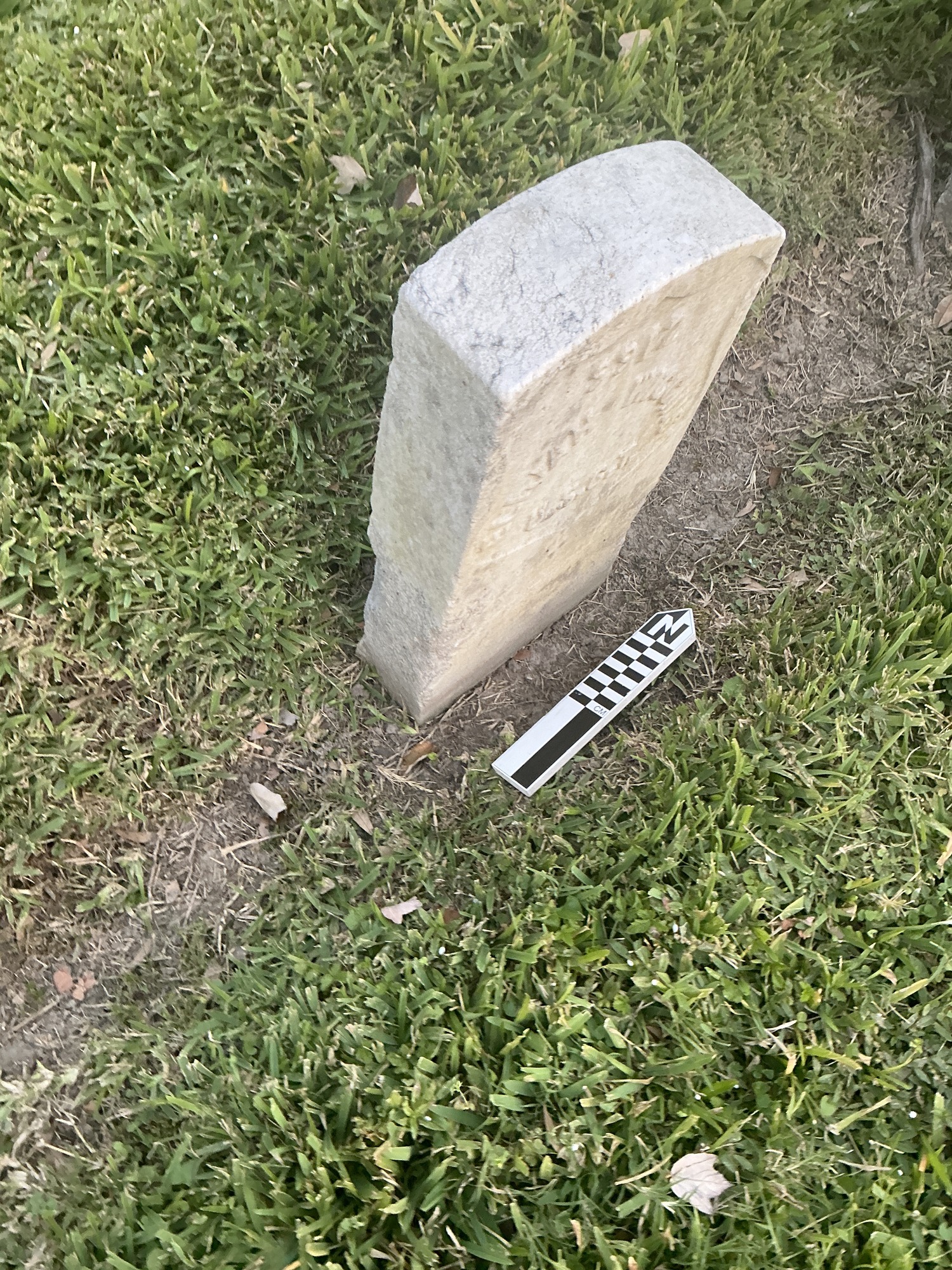 Extra image of historic upright marble headstone with recessed shield face.