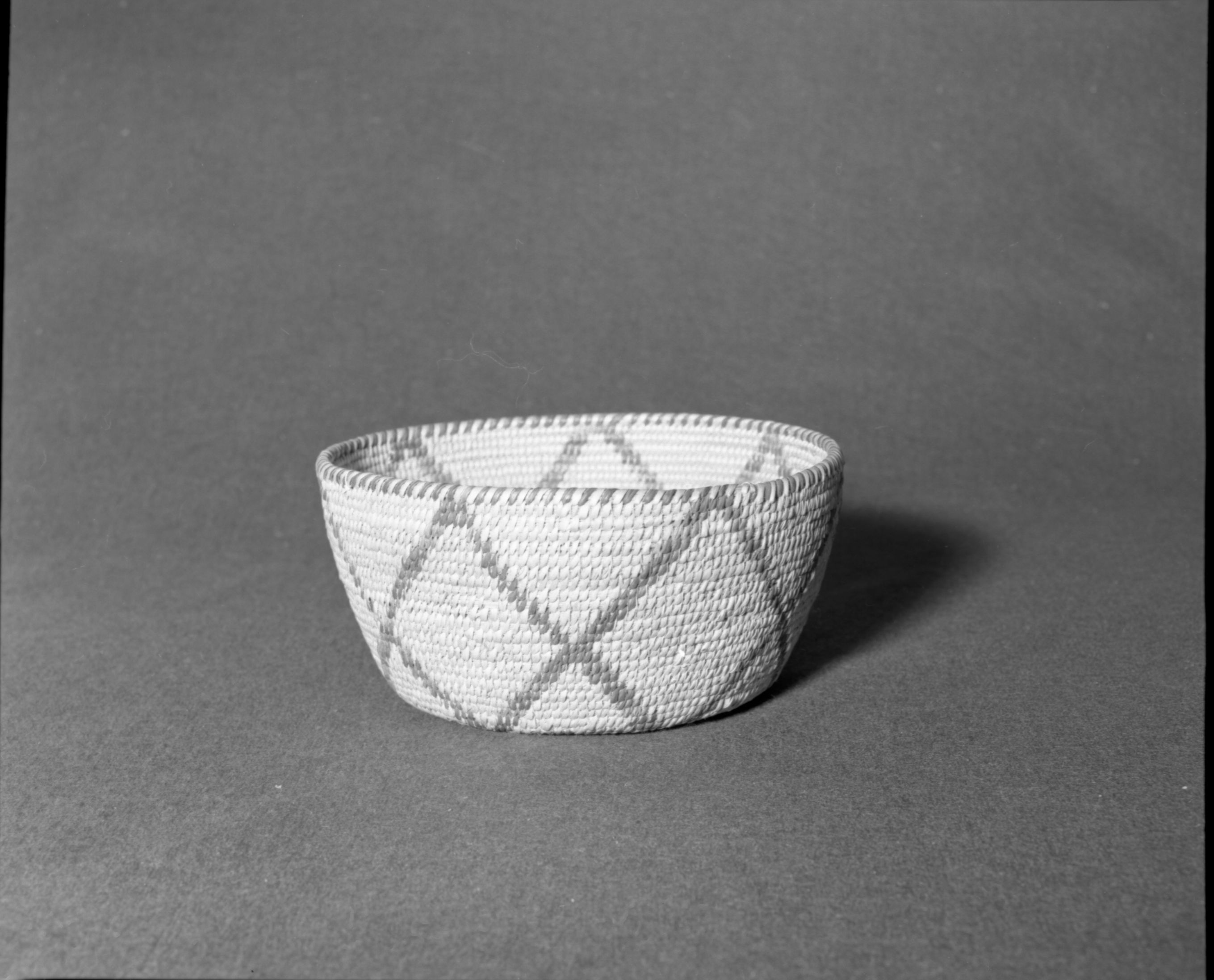 Marie Rozier Collection, Catalog No. 101. Object: Pima basket. Dimensions: 9 1/2 x 5". Materials: willow, devil's claw, cattail stem. Technology: ---. Collection History: Alice Reade Collection. Photographed by Michael Dixon, Dec. 1982. Catalogued by Craig Bates and Barbara Beroza. Yosemite Collections, National Park Service.
