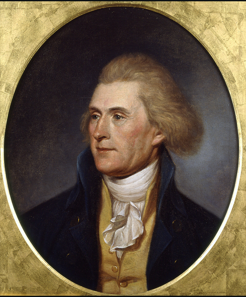  Color portrait of Thomas Jefferson with reddish-blonde hair and blue eyes, set within a gold frame.