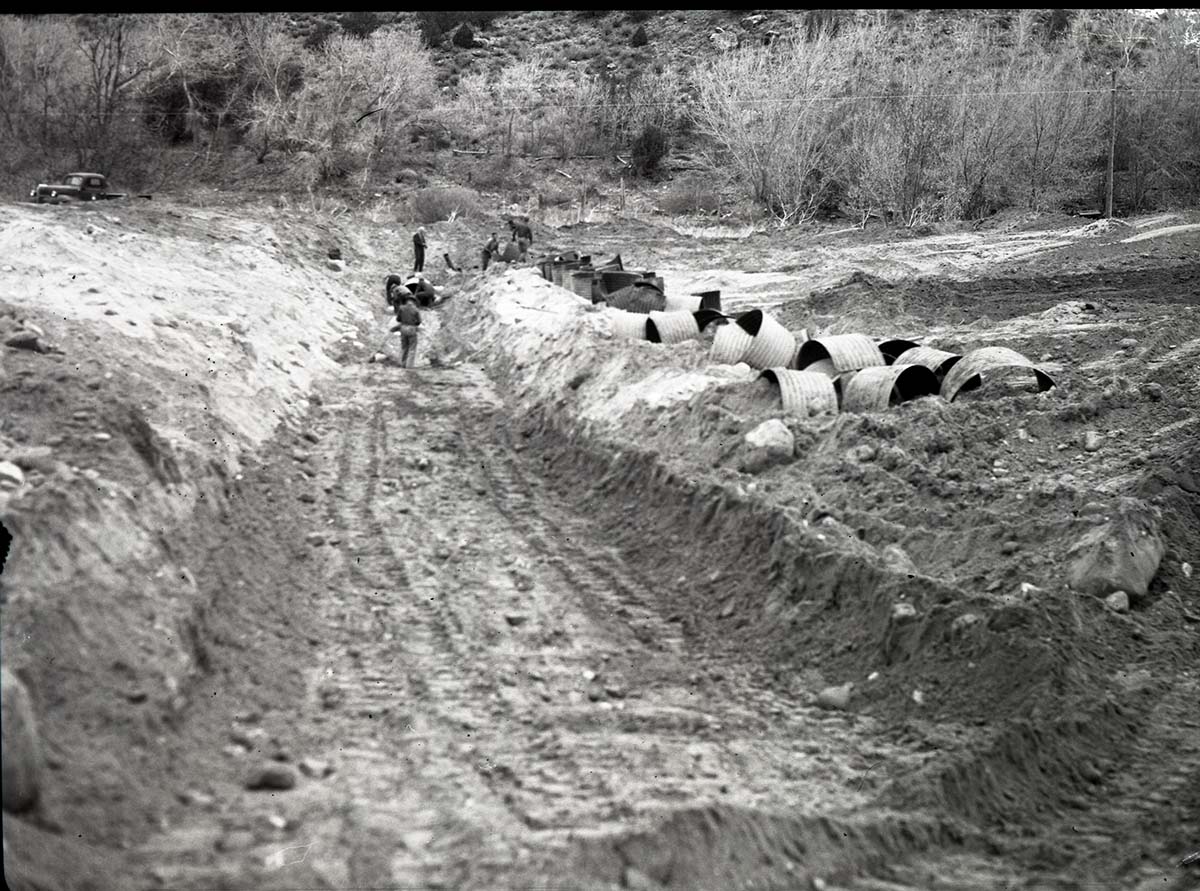 Covered sewage trench exposed- South Entrance sewage disposal field.