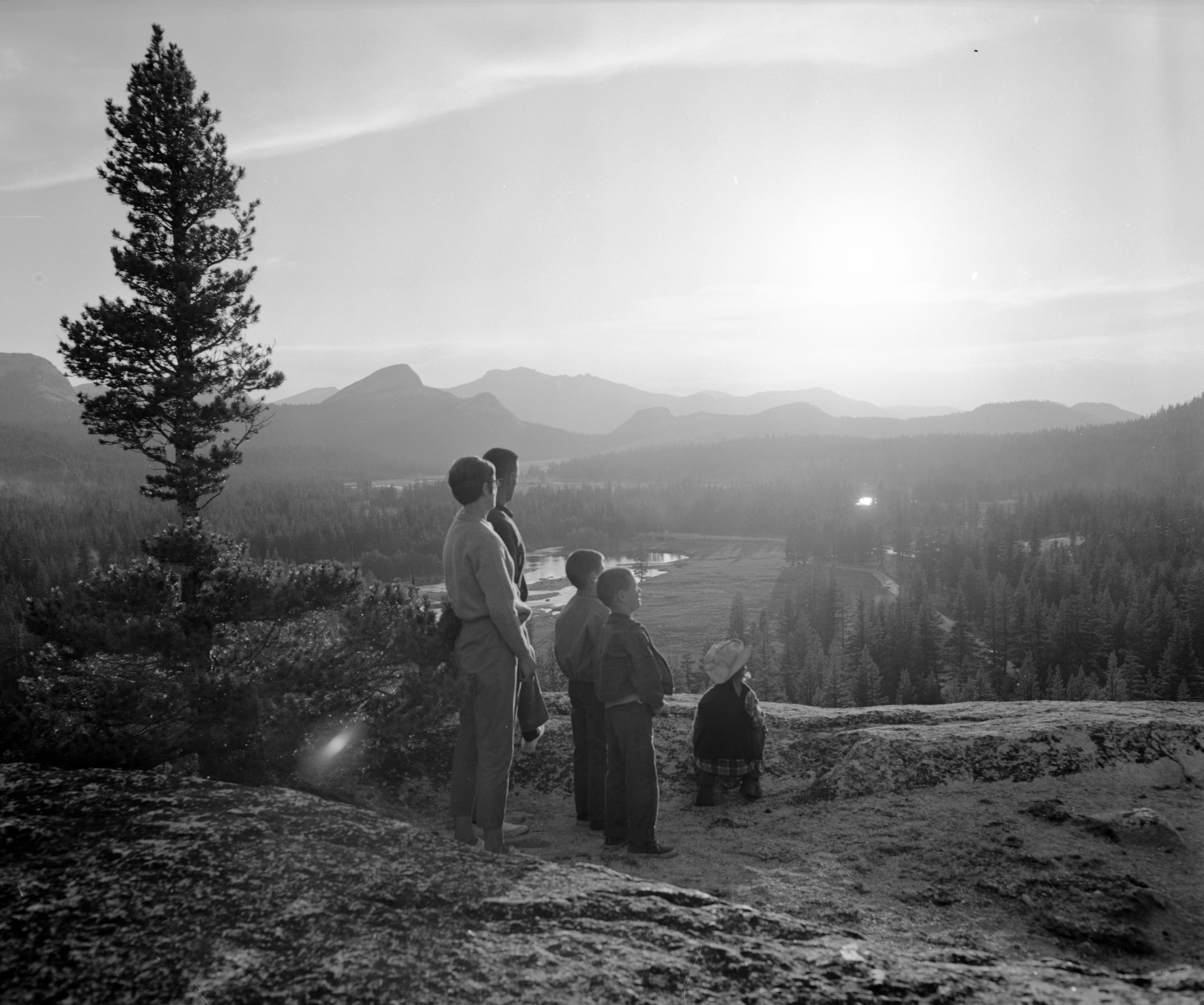Visitors watching sunset at Tuolumne Meadows from Puppy Dome.