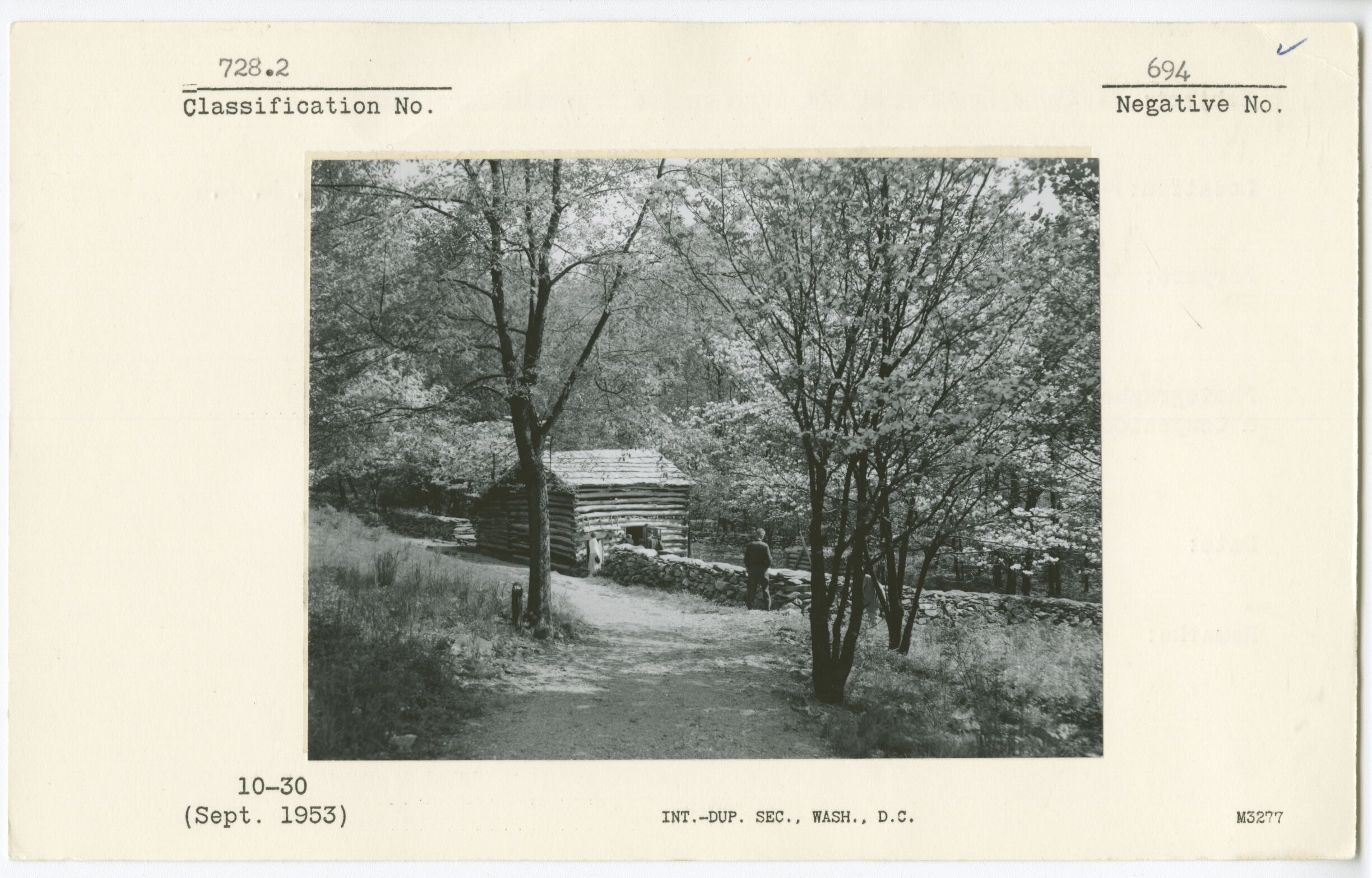 Visitors looking at the barn on the Mountain Farm Trail