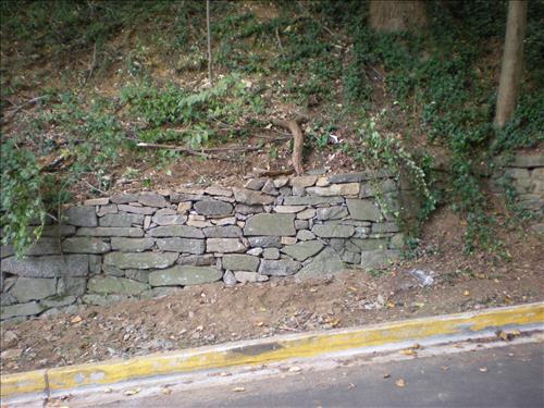 Stone wall repaired under contract on N. Waterside Drive - 10-08-08