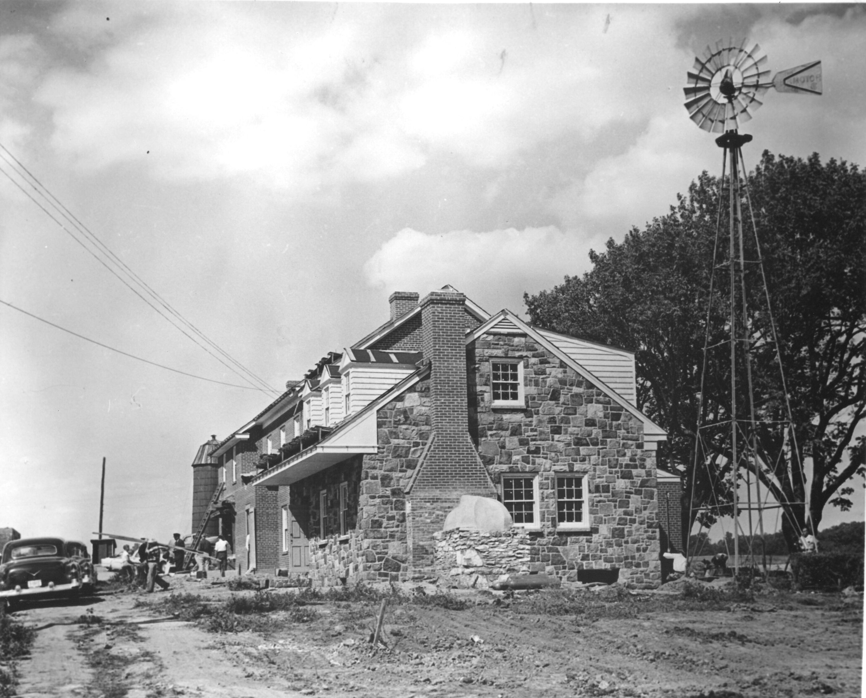 A black and white image of the start of construction on the Eisenhower home.