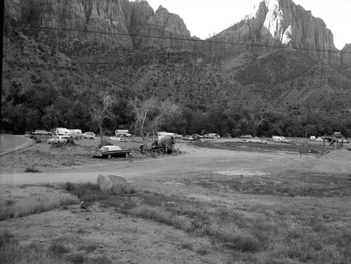 Camper use of overflow area, South Campground overcrowding group area.