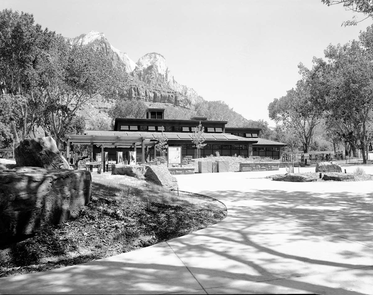 The 2000 visitor center after completion, part of the transportation project which included the shuttle buses, bus maintenance area, the new visitor center (Watchman campground, old a-loop), and new human history museum.