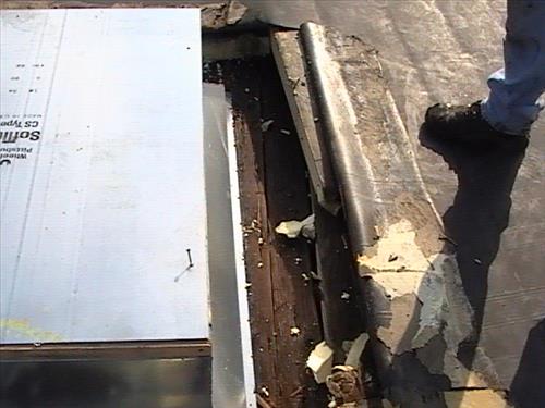 Temporary Repairs of Locomotive Shop Rubber Roof Summer 2009