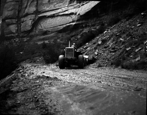Flood damage - tractor cleaning up flood damage in Zion Canyon.