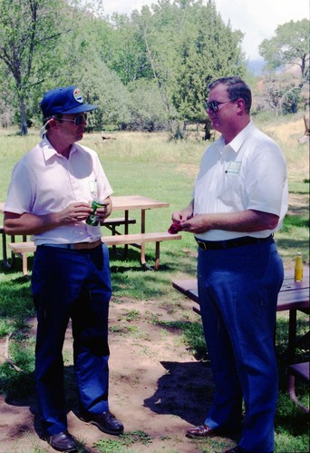 Color Photos of the parks 72nd anniversary celebrations- cake cutting, barbecue, speakers.
